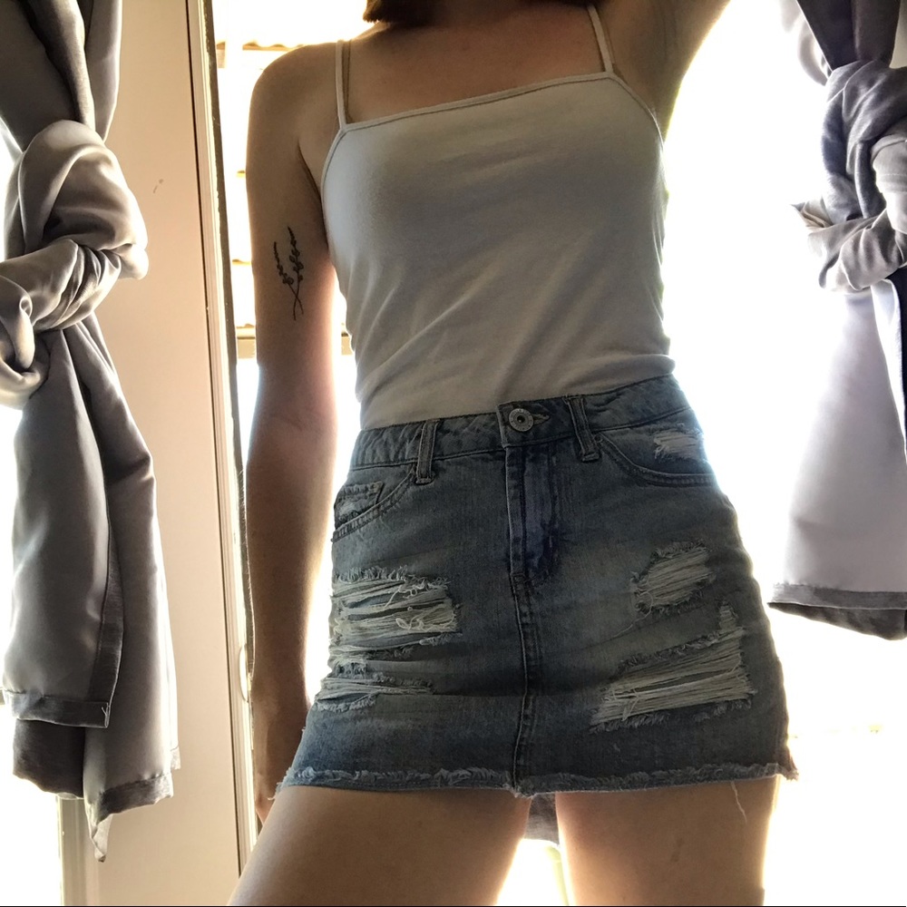 Denim skirt with rips